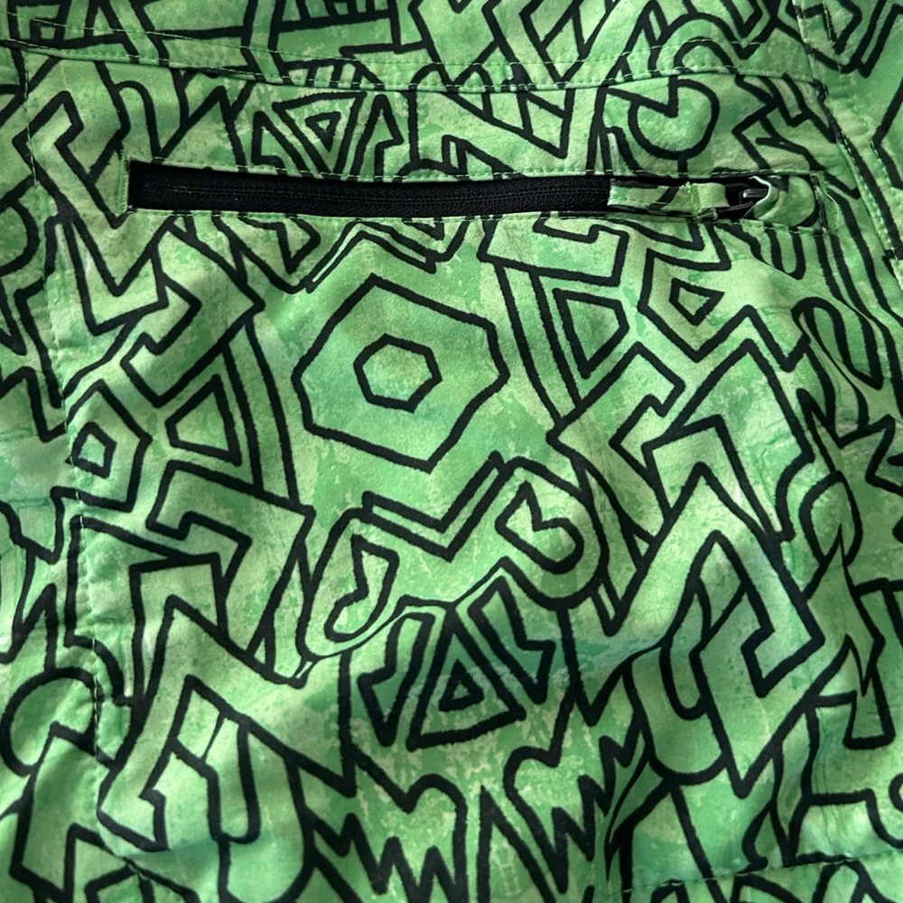Under Armour Heat Gear Loose Fit Green and Black Pattern Board Shorts, Size 38